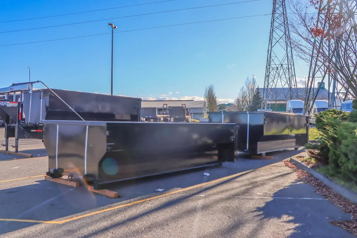 Roll-off dumpster ready for waste disposal at job site for Demolition Dumpster Rental in Rolesville